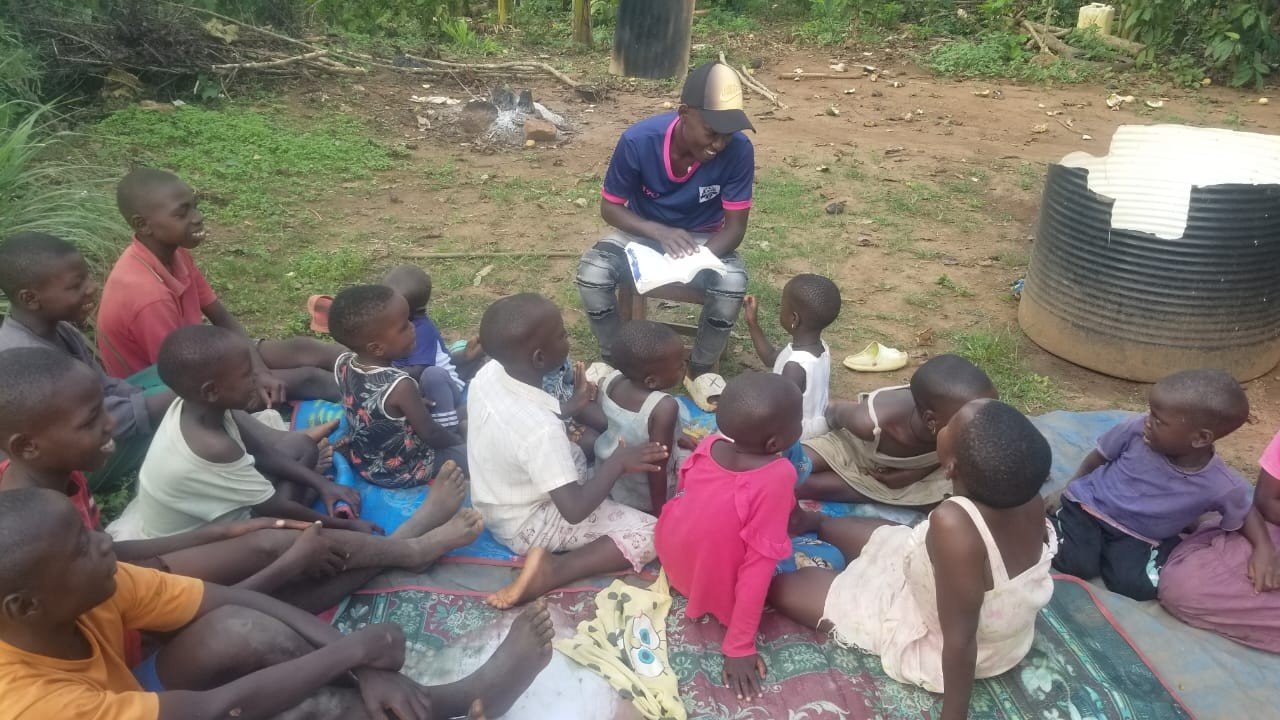 Brother Syrus Jjuuko with children